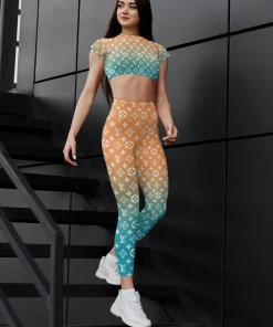 Gradient orange–teal monogram activewear set – fitted crop top & high-waist leggings