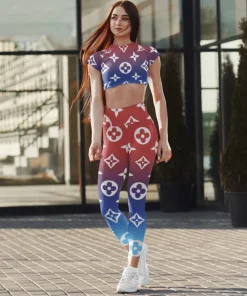 Red–blue gradient oversized monogram activewear set – fitted crop top & high-waist leggings